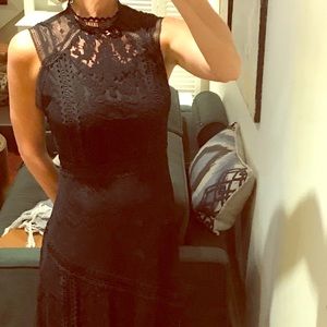 Black lace dress with handkerchief hem